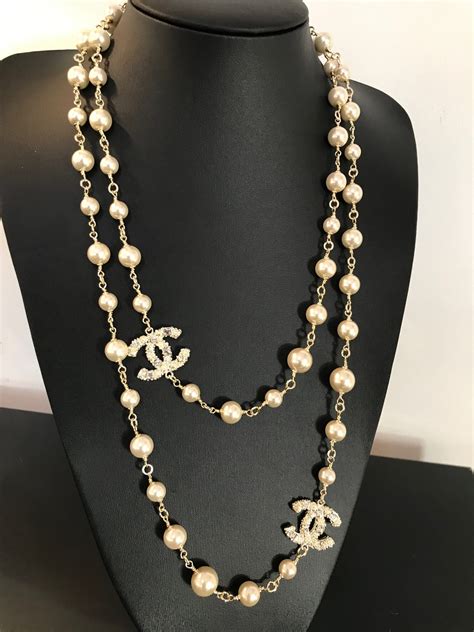 chanel black crystal necklace|Chanel pearl long strand necklaces.